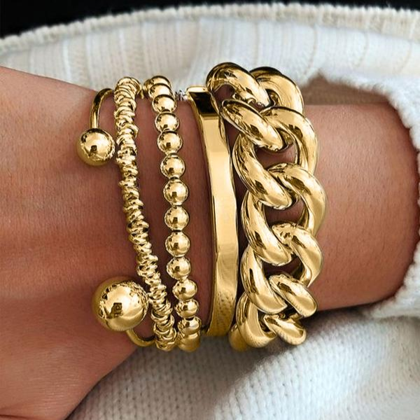 Gold-tone overlapping bracelet set with beaded rows and chunky chain links (5 pieces)