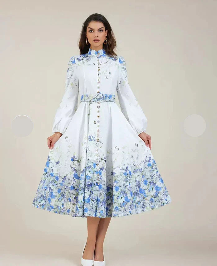 White-blue floral midi dress with high neck, tie waist and long sleeves with full skirt