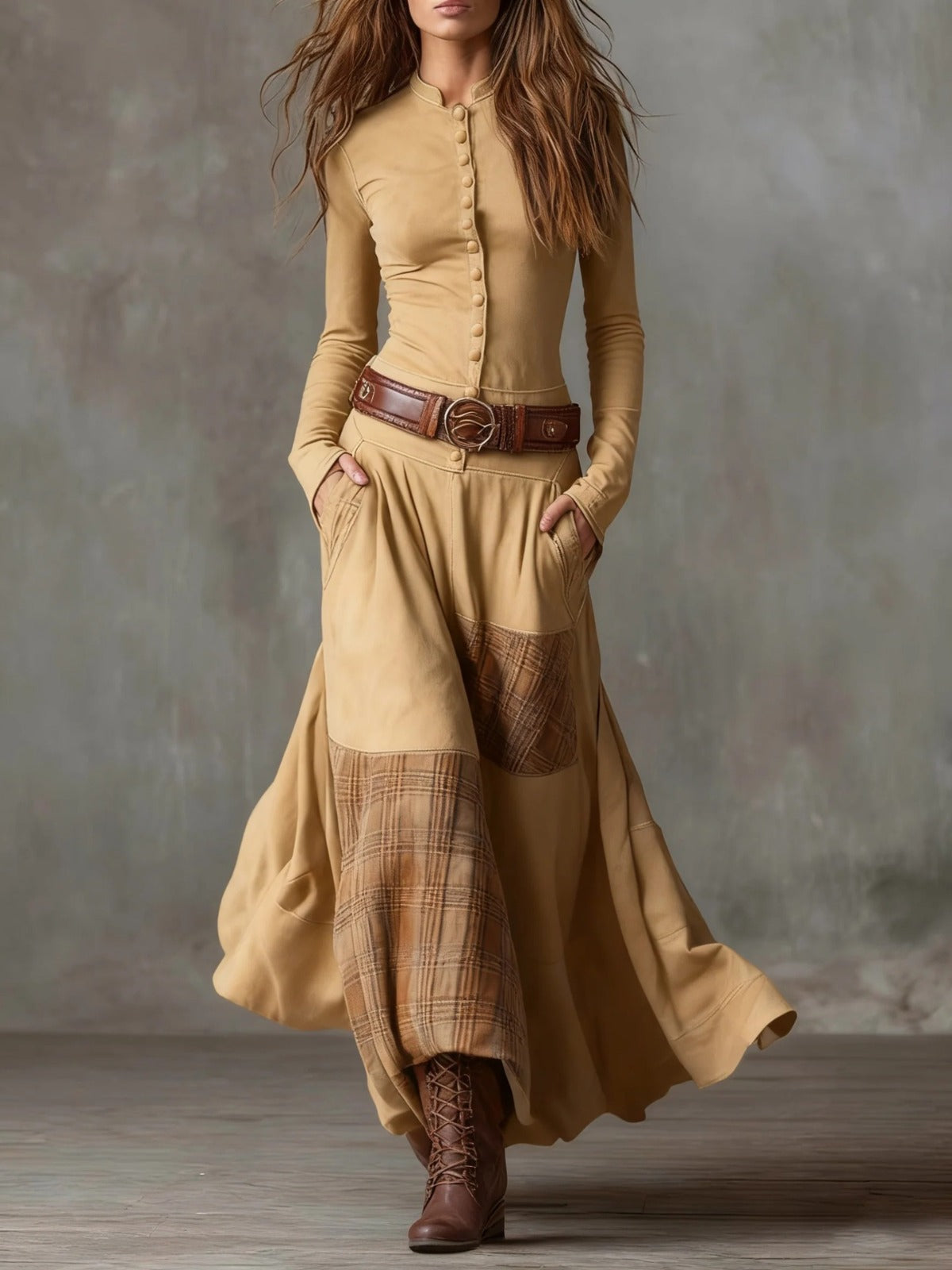 Beige suede-look maxi dress with front buttons, wide leather belt, and plaid patchwork panels