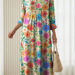 Women's multicolor floral comfort dress with V-neck and gathered waist, three-quarter sleeves