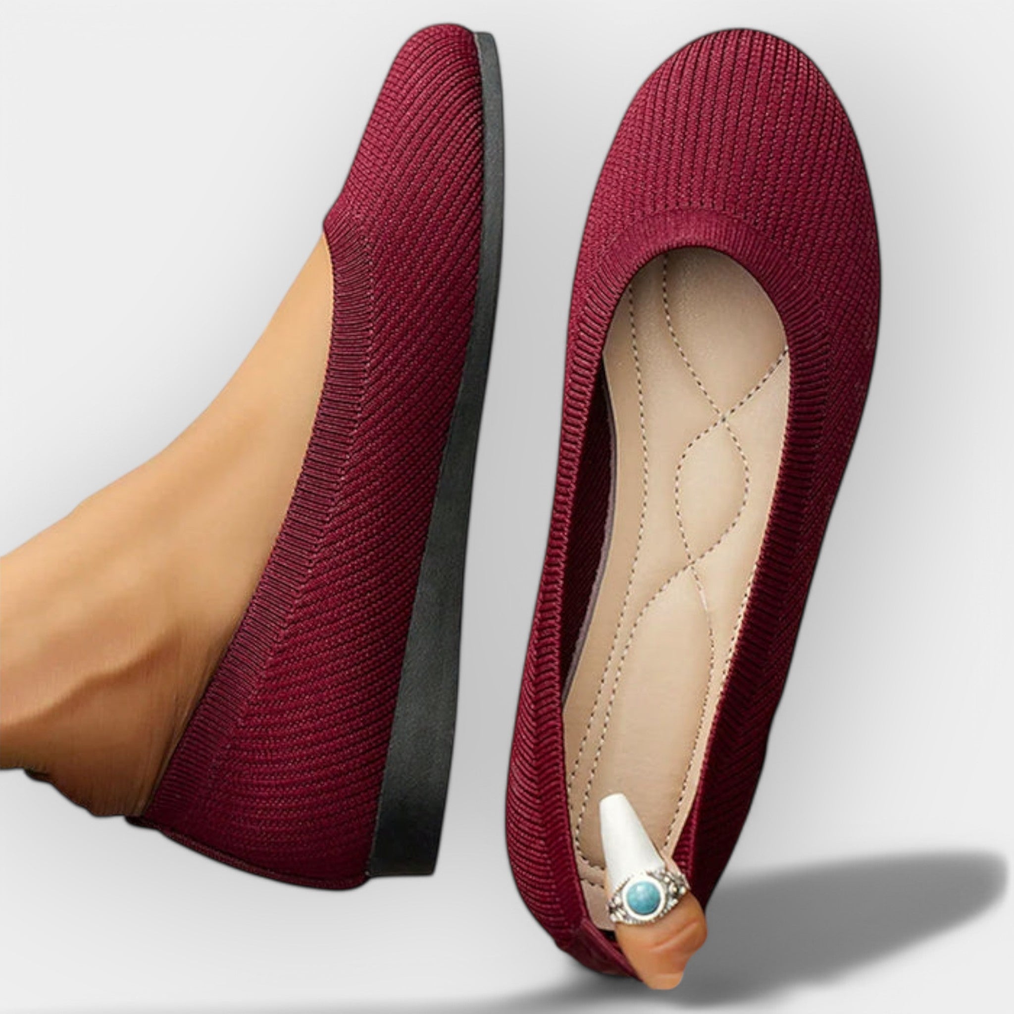 Burgundy knit slip-on ballet flats with rounded toe and flat sole