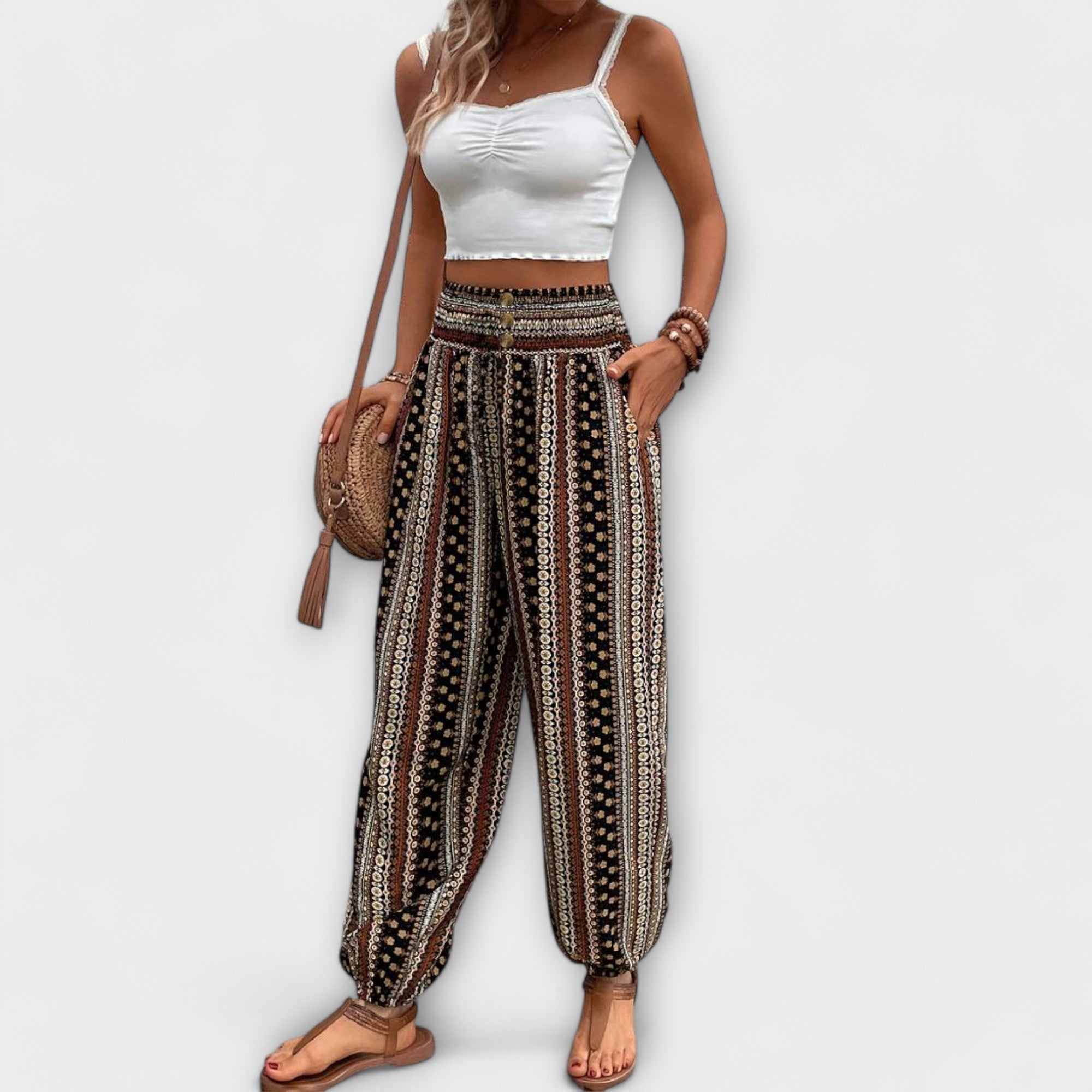 Black-and-cream vertical patterned ethnic harem pants with elastic waistband and relaxed fit