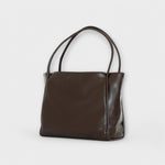 Dark brown leather-look tote bag, front and side view with top handles