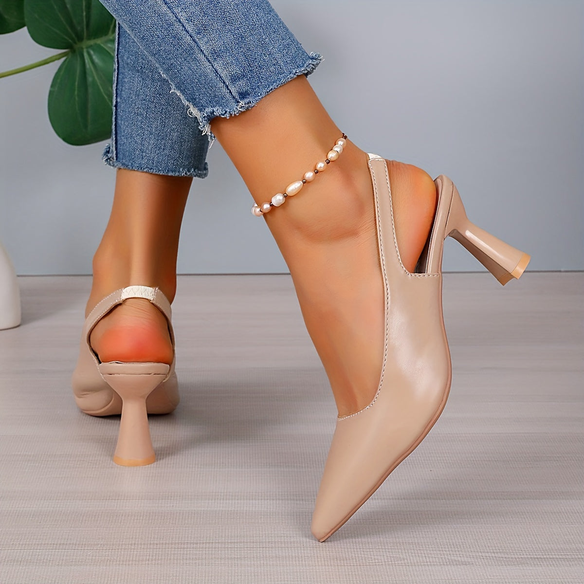 Beige orthopedic pointed-toe slingback heels with mid block heel and ankle strap