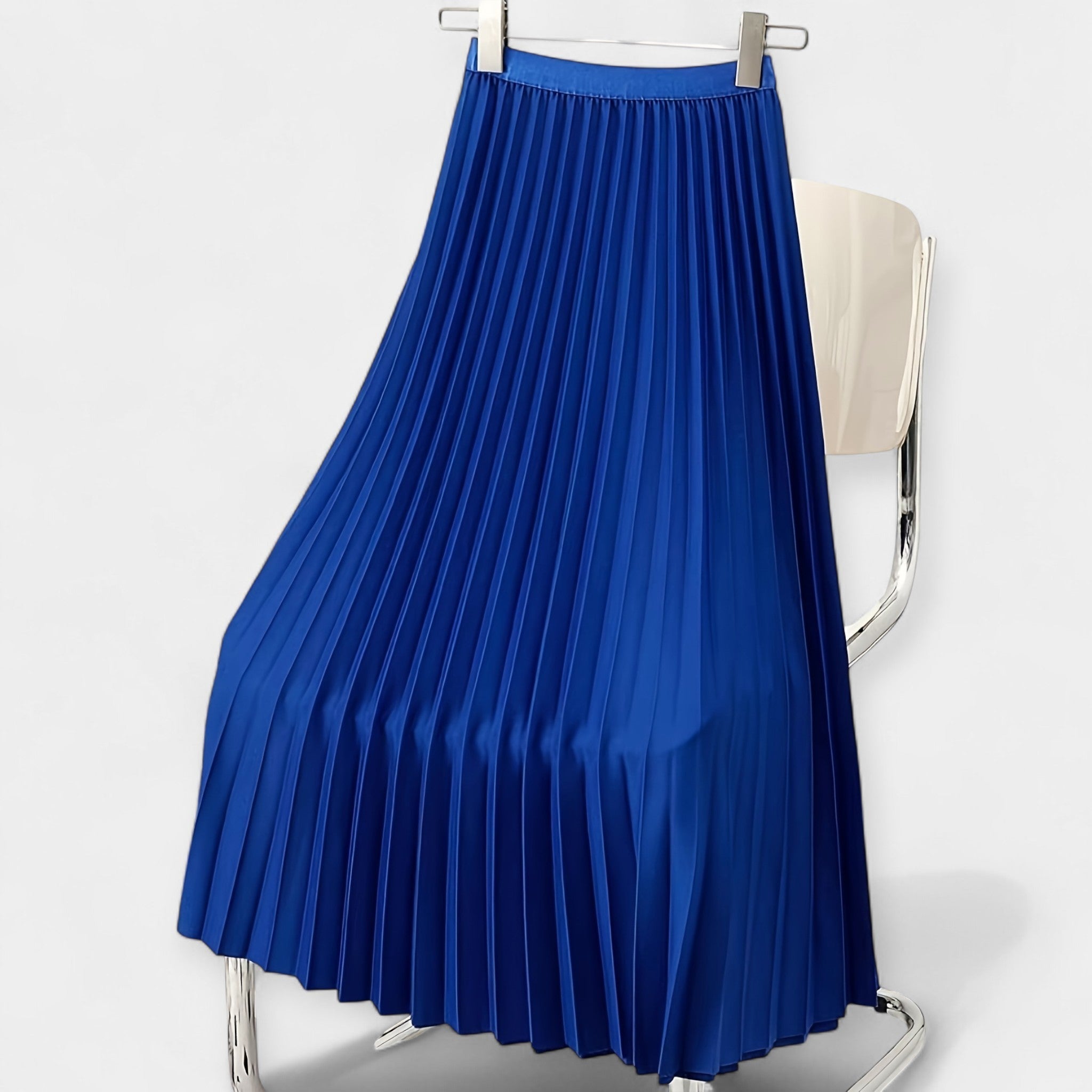 Long pleated satin skirt, royal blue with elastic waistband and airy A-line fall.