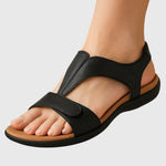 Black orthopedic sandals with open toe, two padded straps, and thick supportive sole