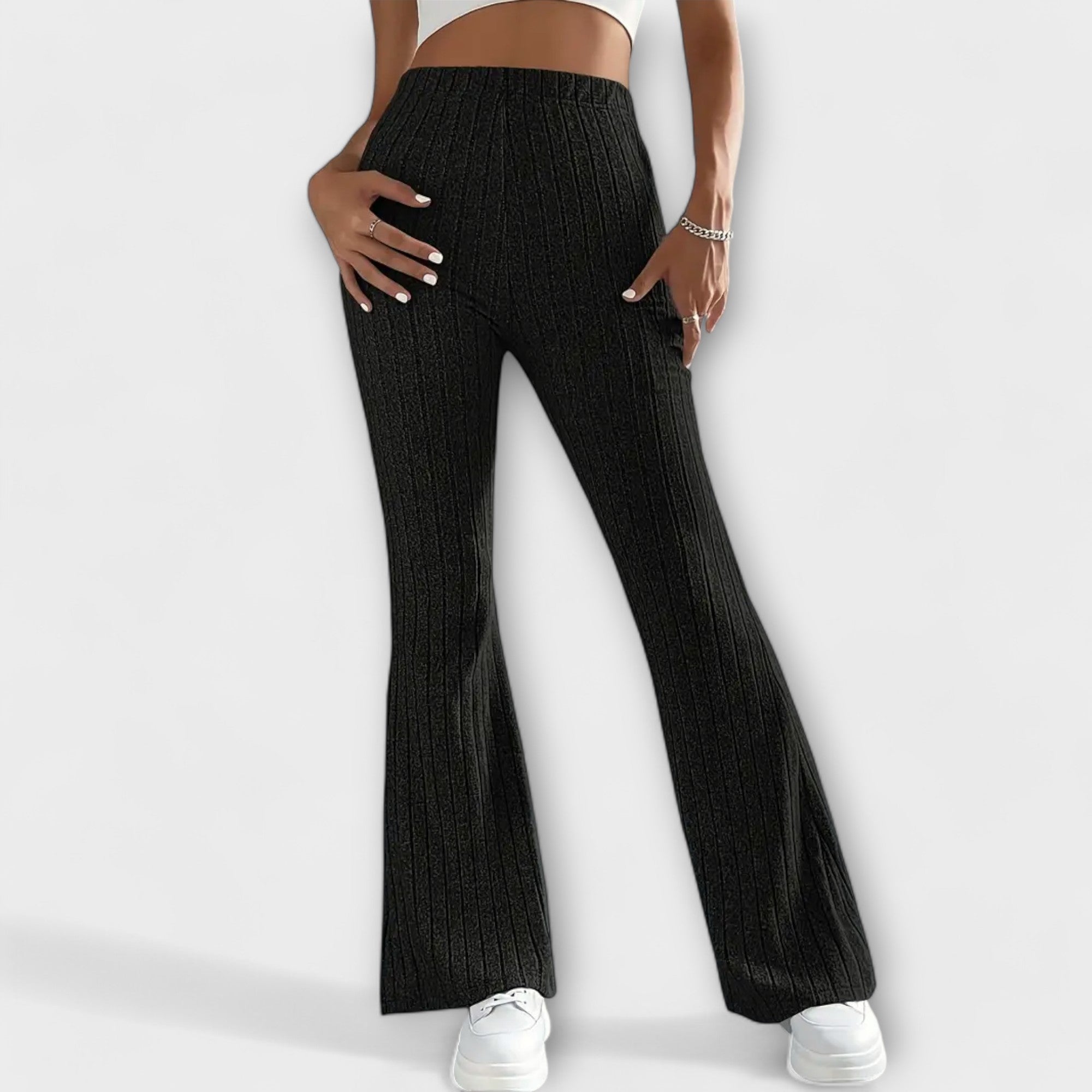 Black ribbed knit high-waist flare pants, full length with wide bell-leg