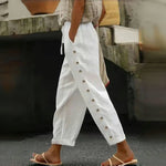 Dorin straight-leg trousers with drawstring waist and side buttons, white