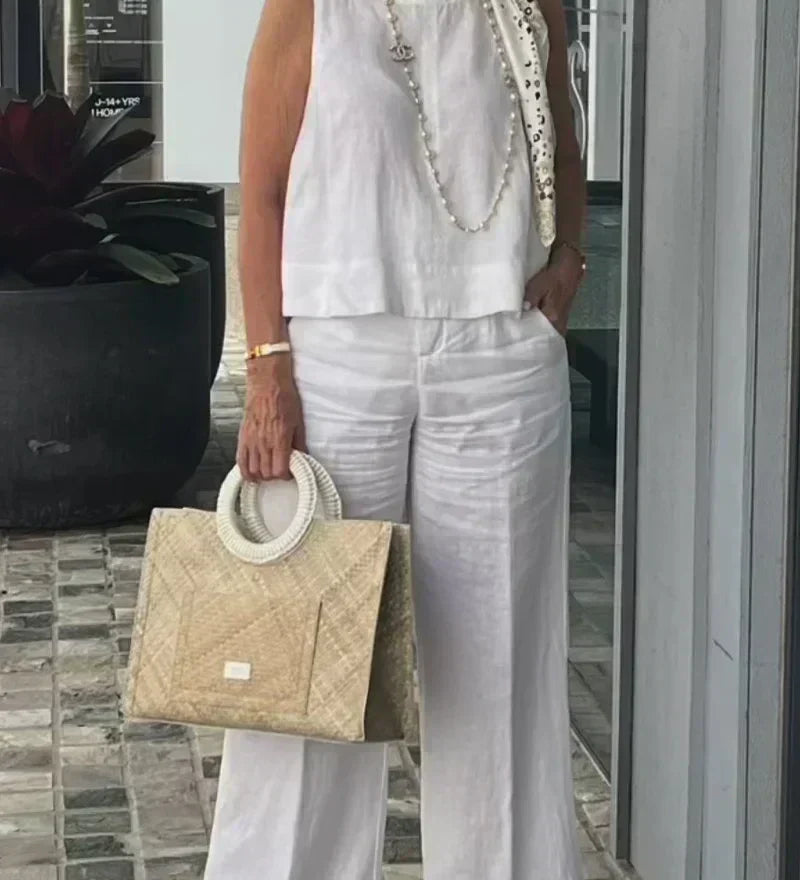 White sleeveless cotton-linen top with wide-leg pants