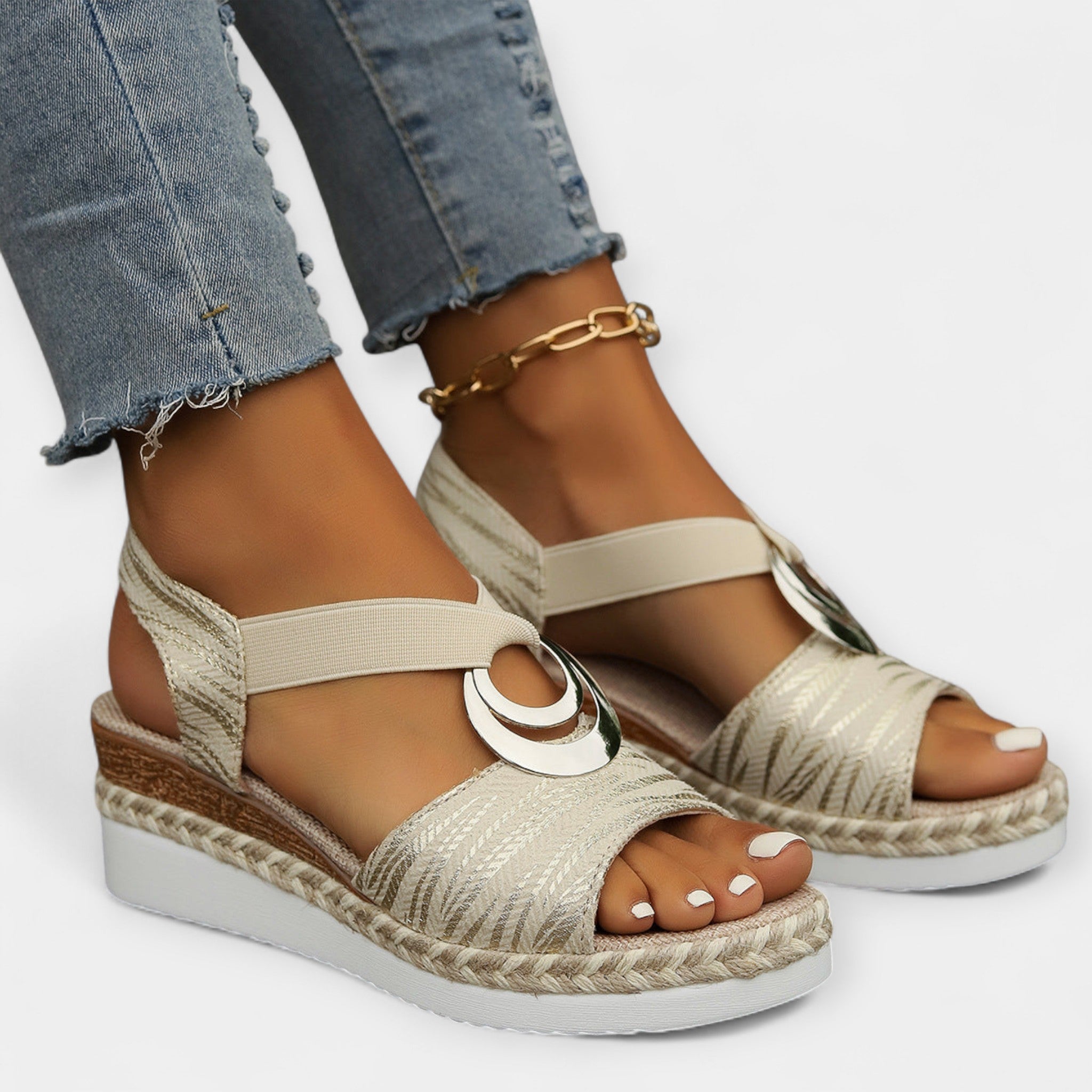 Roman knit sandals, cream open-toe with gold ankle chain and espadrille platform