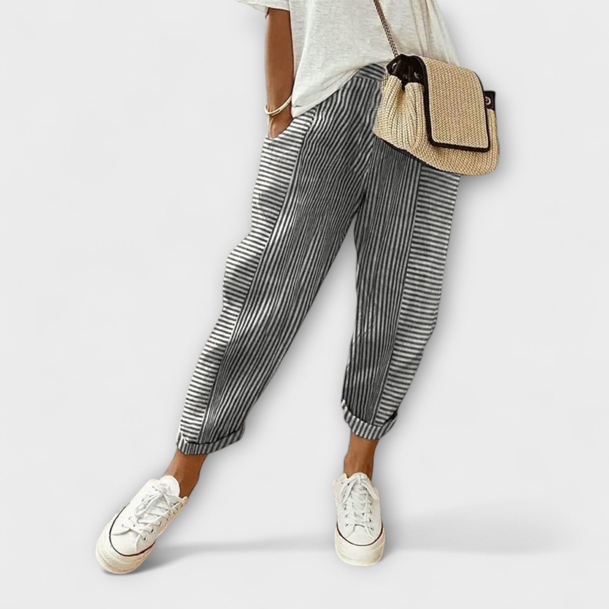 Comfort striped pants in black with light vertical pinstripes, cuffed hems