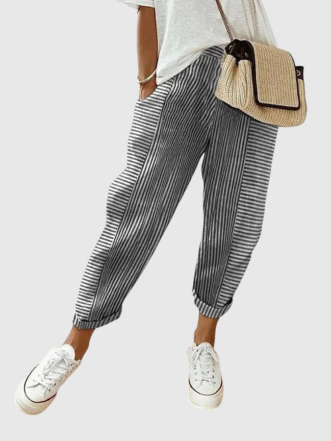 Nina pinstriped trousers in slate gray and white with gathered ankle cuffs