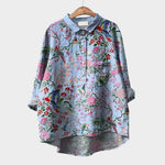 Floral button-up blouse with collar, long sleeves, and chest patch pocket