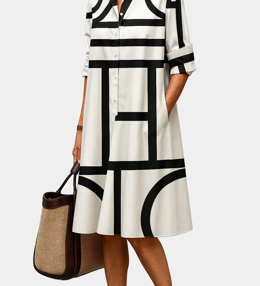 Summer dress with black-and-white geometric blocks, collared button-front, 3/4 sleeves