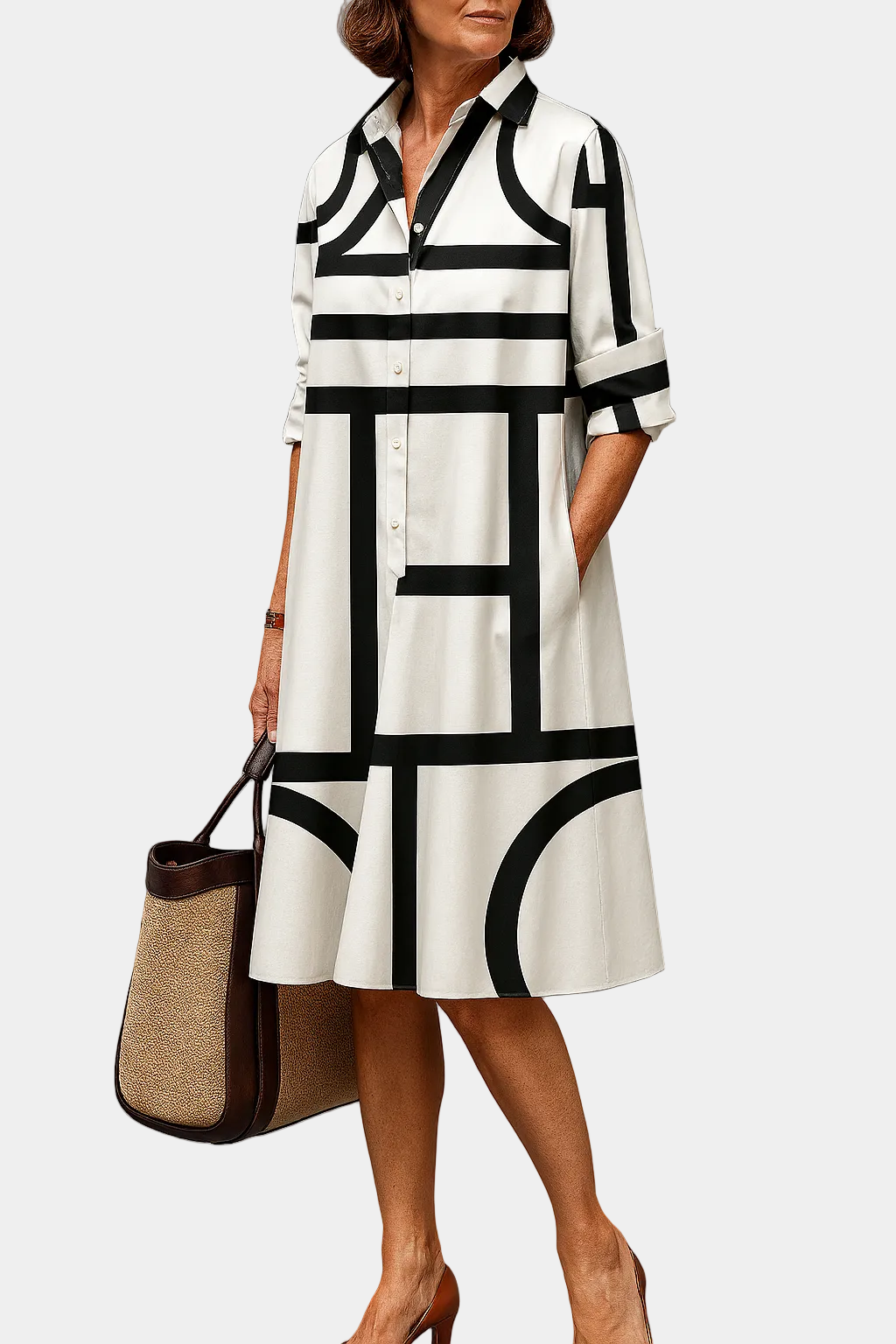 Summer dress with black-and-white geometric blocks, collared button-front, 3/4 sleeves