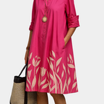 Daphne summer shirt dress in pink with button-front and leaf-print hem