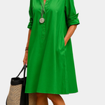 Green button-front summer dress with 3/4 sleeves and stand collar