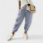 Comfort striped pants in blue with light vertical pinstripes, cuffed hems