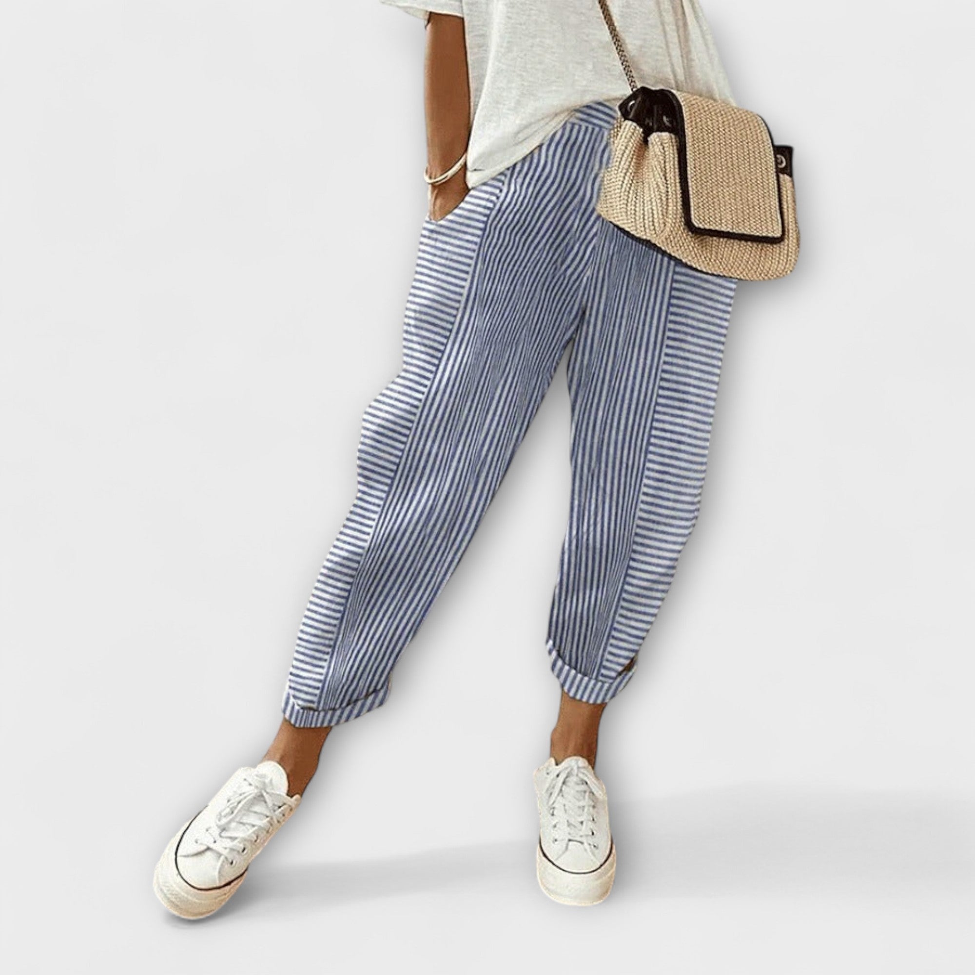 Comfort striped pants in blue with light vertical pinstripes, cuffed hems