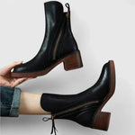 Black leather ankle boots with side zipper and block heel