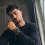 Black multi-wrap Apple Watch bracelet with volcanic stone beads and stainless clasp