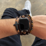 Brown multi-row watch band with cross charm and wood-tone bead strands