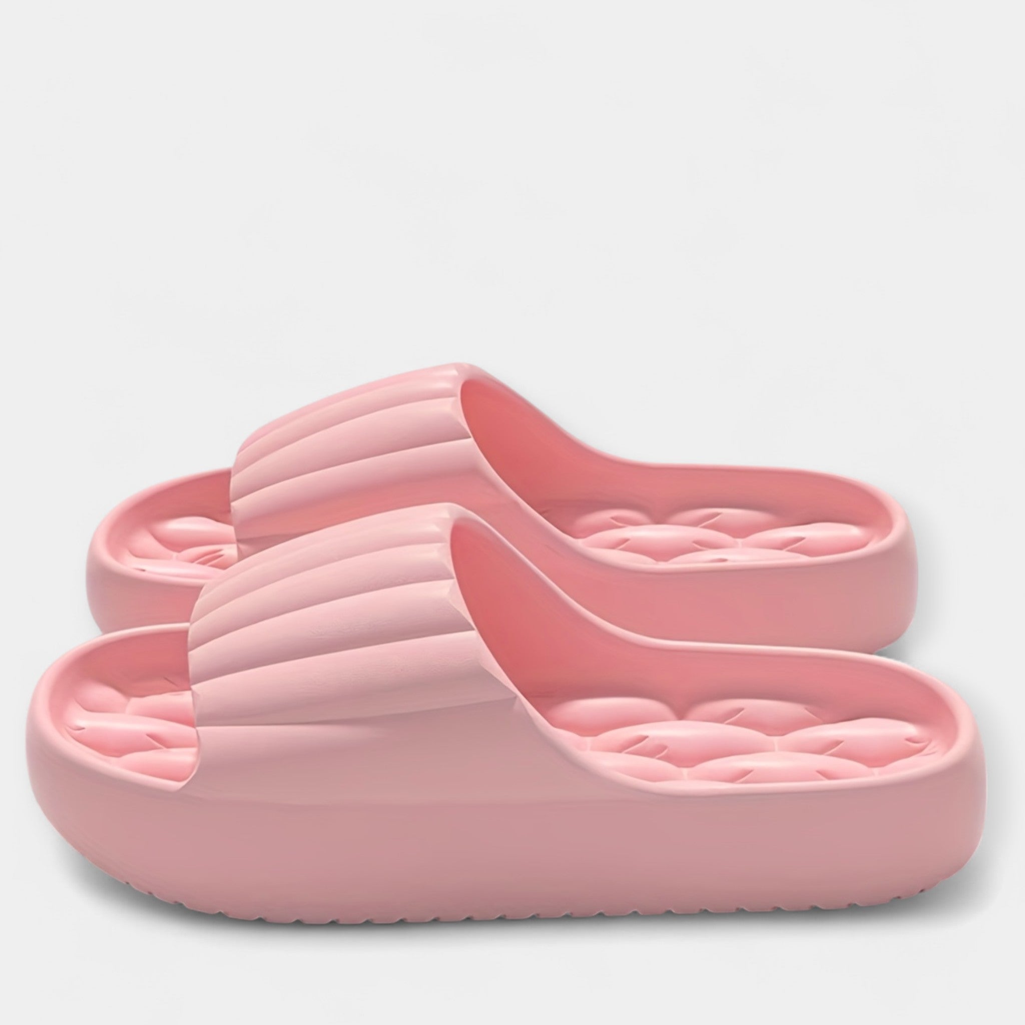 All-season slippers, pink molded slip-on slides with textured footbed and wide strap
