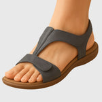 Dark gray orthopedic sandals with open toe and two padded straps on a supportive sole