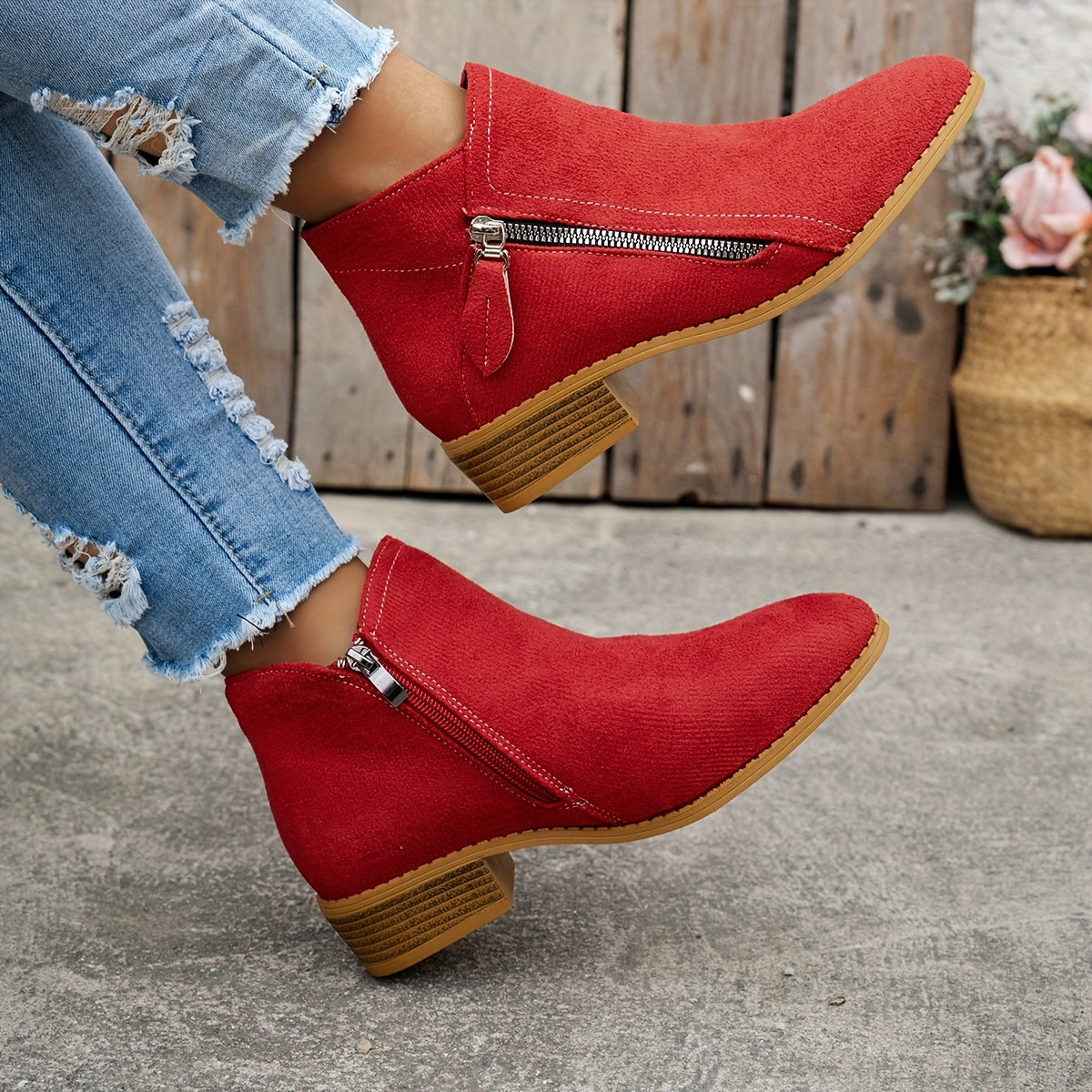 Red orthopedic ankle boots with side zipper and cushioned ankle collar