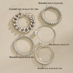 Silver-tone overlapping bracelet set with five designs: beaded, chain, and hoop styles