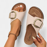 Lukia pale pink cork sandals with large round buckle, open toe and footbed view