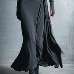 Charcoal gray maxi silk dress with side drape and knotted waist detail, long sleeves