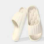All-season slippers, white molded slip-on slides with textured footbed and wide strap