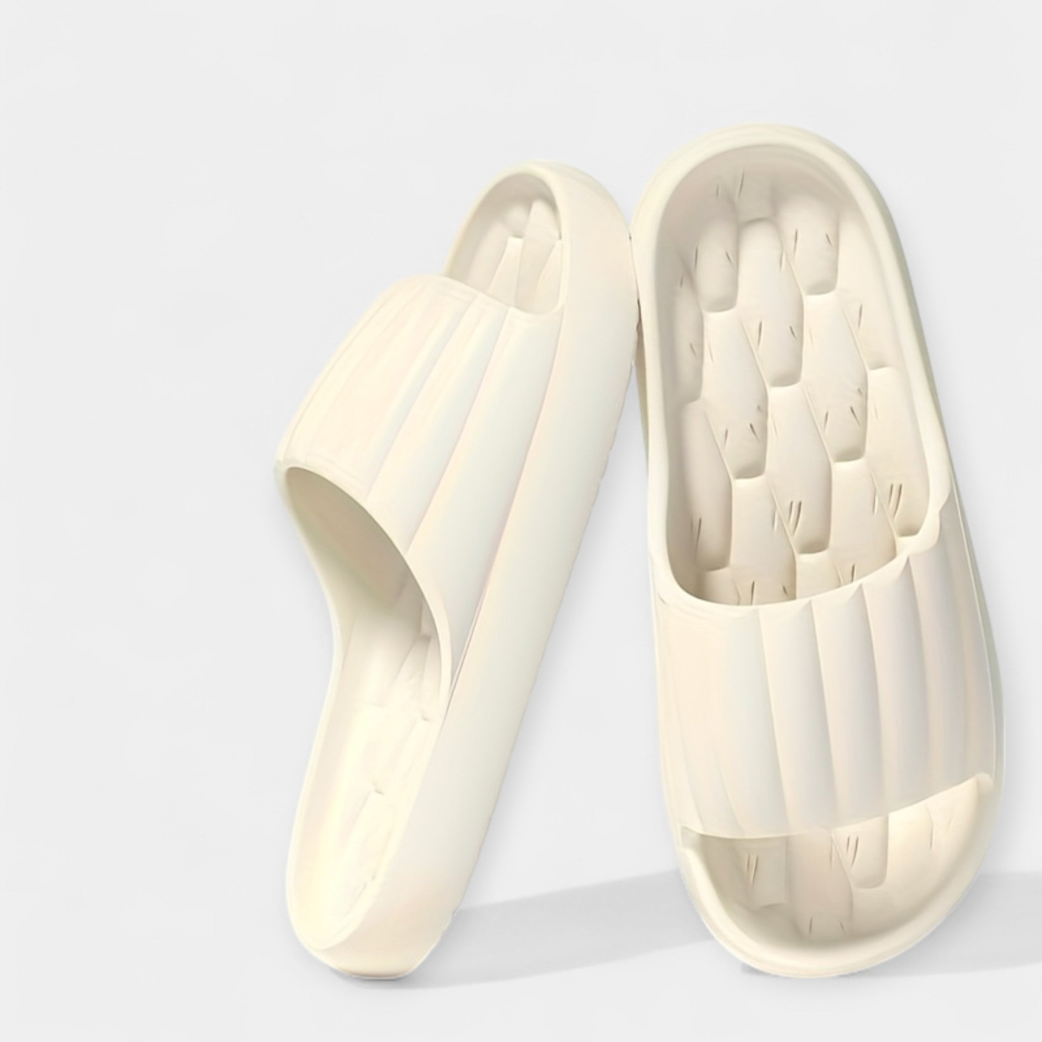 All-season slippers, white molded slip-on slides with textured footbed and wide strap