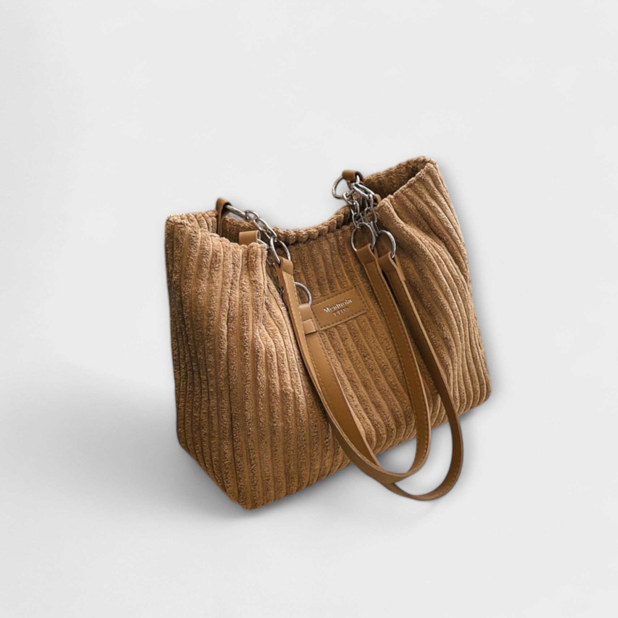 Tan ribbed shoulder bag with chain straps and front label