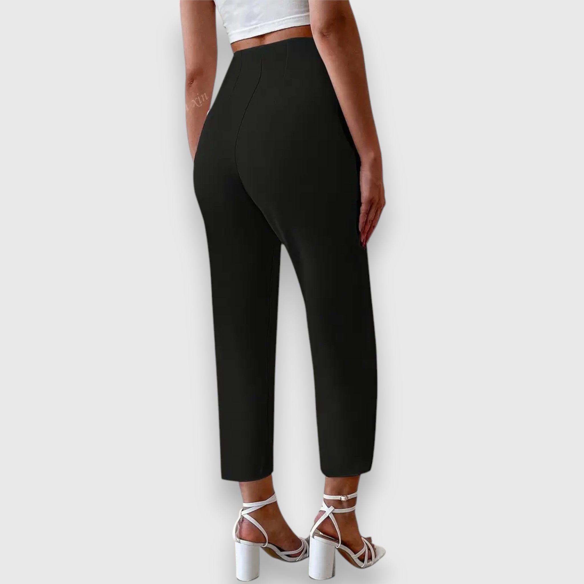 Black high-waisted trousers, straight leg, ankle length, back view