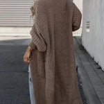 Brown taupe long knit cardigan, back view, relaxed drape with ribbed cuffs