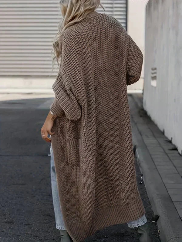 Brown taupe long knit cardigan, back view, relaxed drape with ribbed cuffs