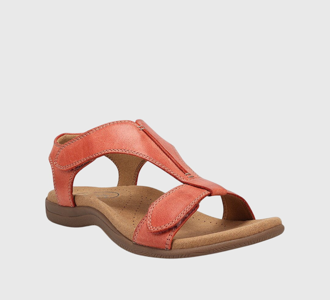Orange orthopedic sandals with open toe, cushioned sole, and two wide adjustable straps