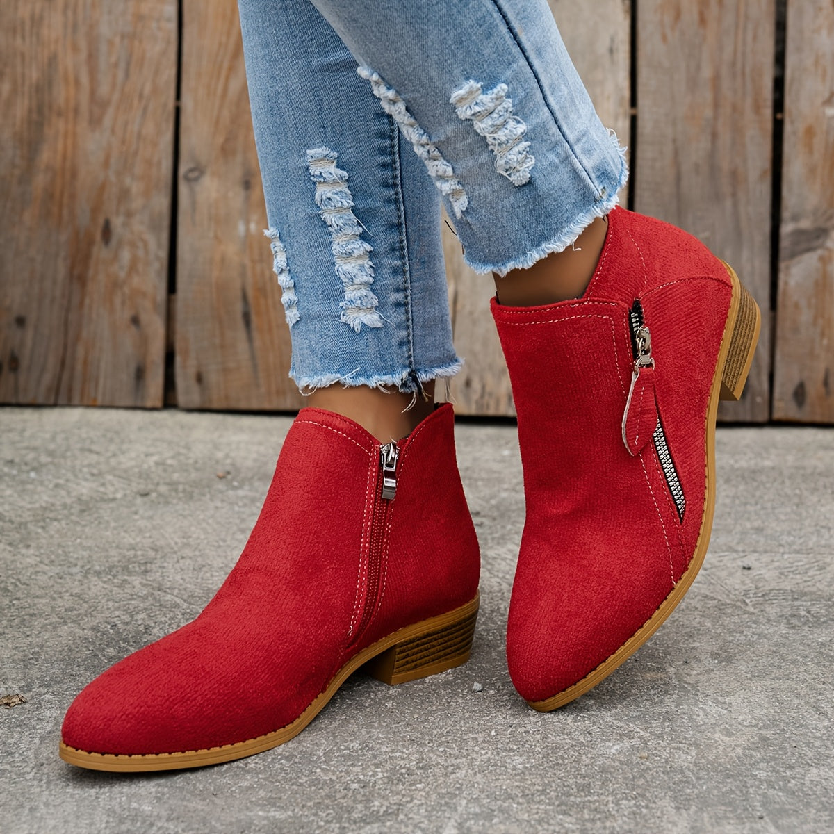 Red orthopedic ankle boots with side zipper, ankle height, and block heel