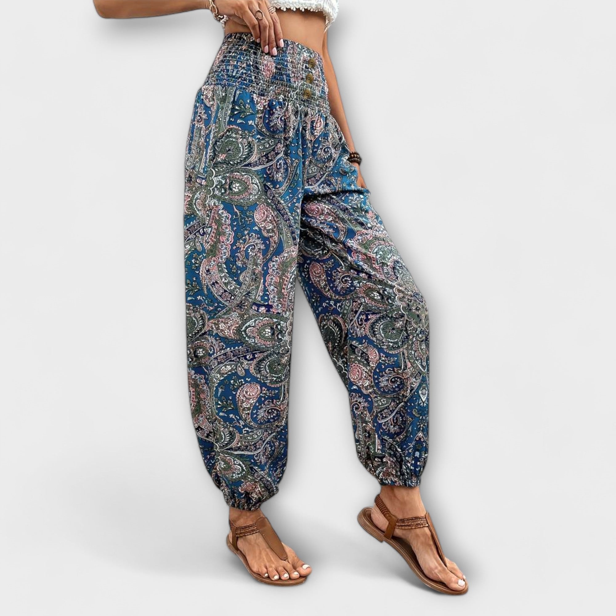 Blue paisley printed harem pants with elastic waistband and elastic ankle cuffs