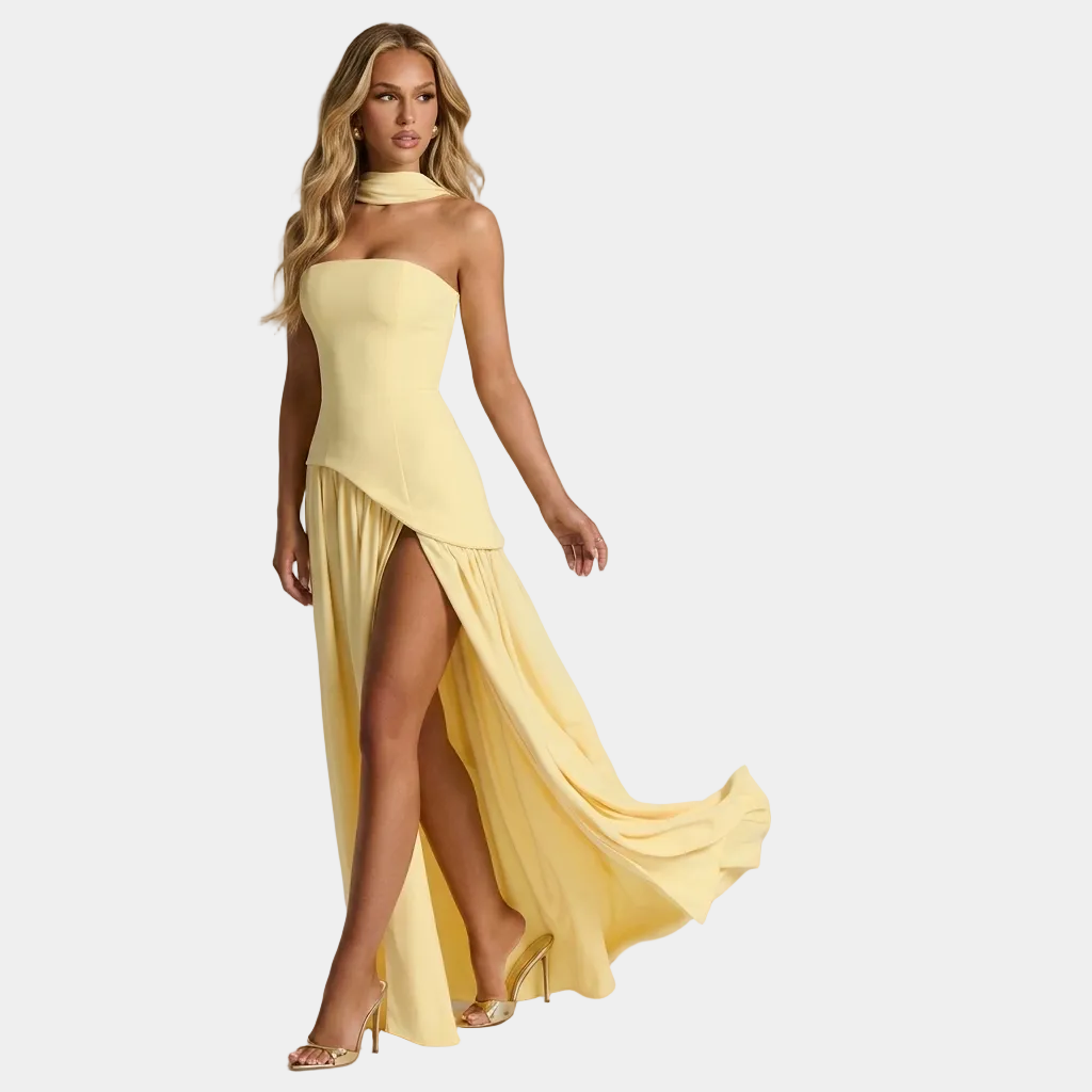 Maxi women’s strapless dress in light yellow with side slit and draped skirt