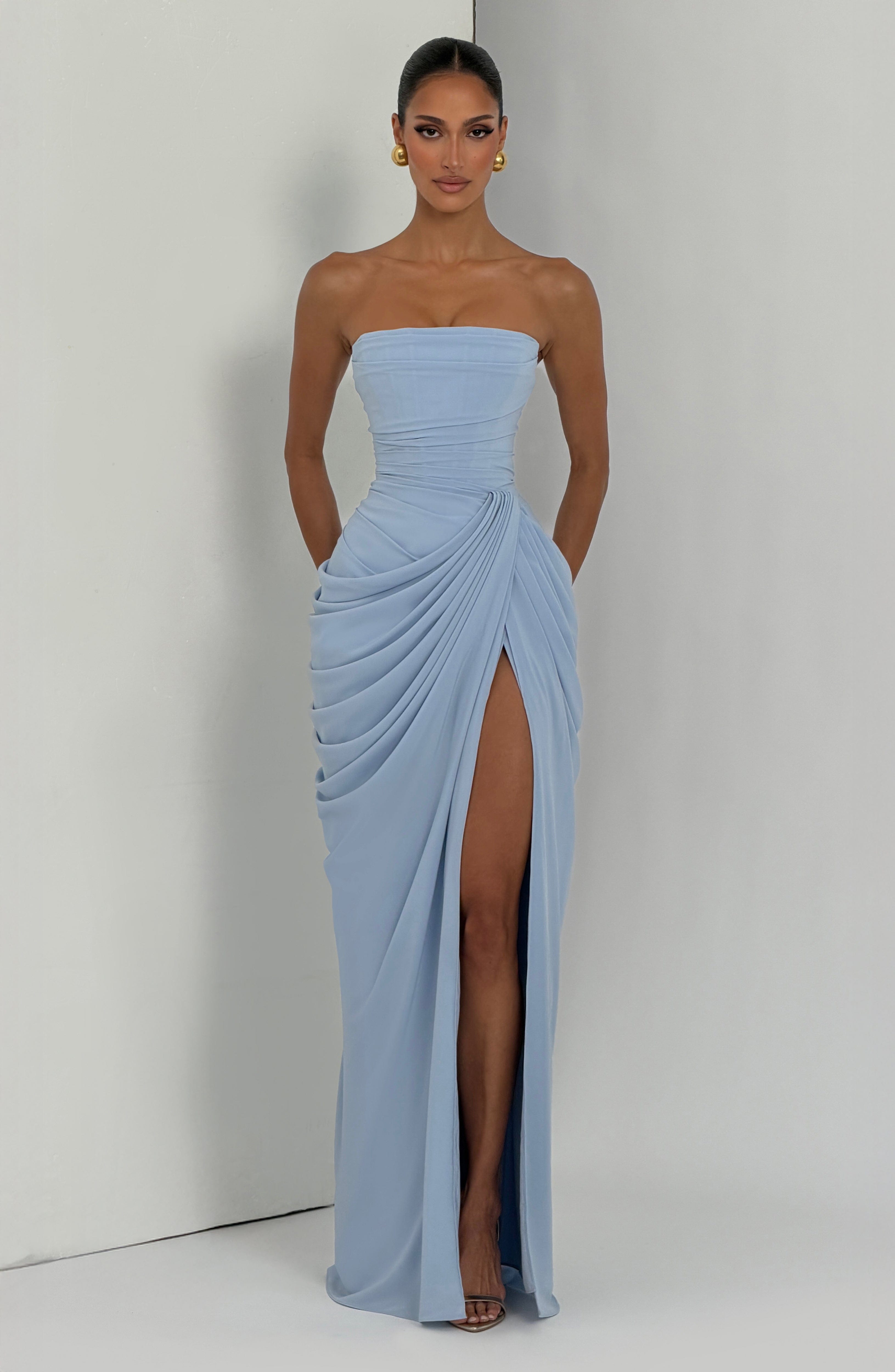 Strapless maxi gala dress with corset bodice and draped skirt slit, light blue