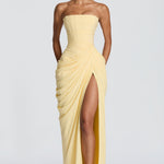 Strapless pale yellow corset maxi dress with draped front and high thigh slit