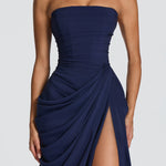 Navy strapless corset maxi dress with gathered drape over the skirt, side slit
