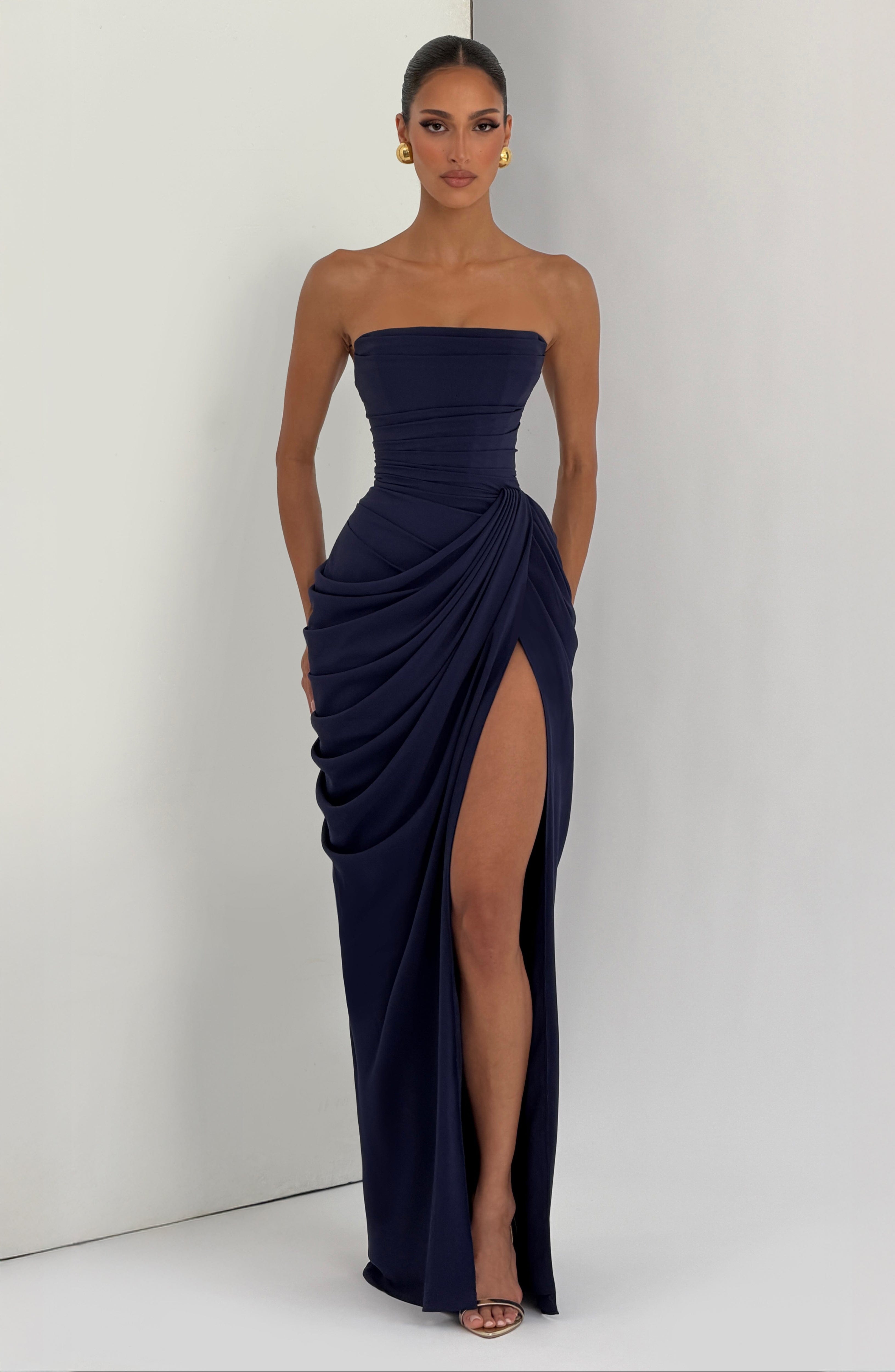 Navy strapless corset maxi dress with draped overlay and high front slit