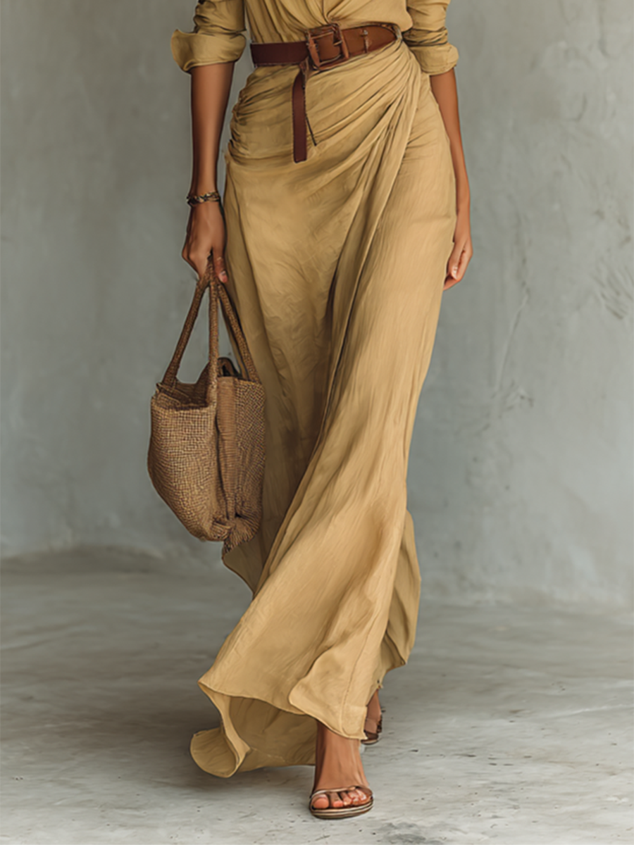 Khaki draped maxi dress with V-neck buttons and belted waist; long skirt and sleeves
