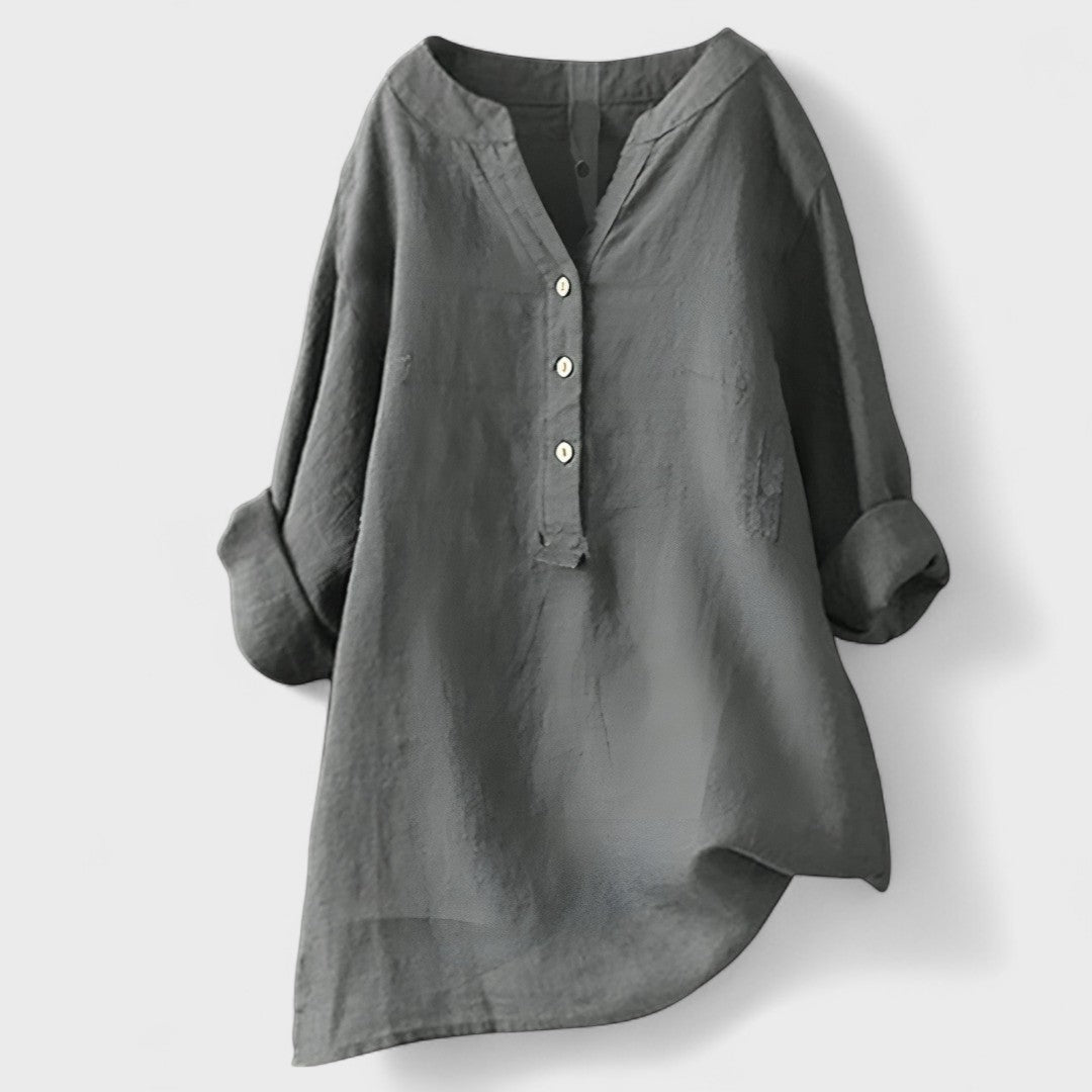 Light gray comfort shirt with V-neck, button front, and loose cuffed sleeves