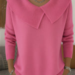 Pink knit sweater with soft fold-over collar and V-neck, long sleeves