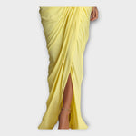 Yellow maxi dress with side slit and cascading pleated drape
